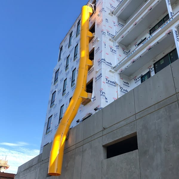 YellowChutes.ca Superchute curving around a podium.