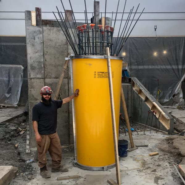 SlikForms.ca Pouring a small column with a SlikForm.