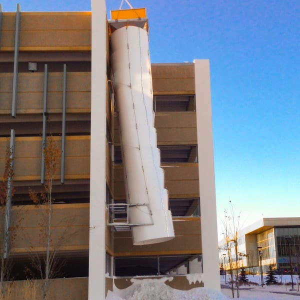 SnowChutes.ca Large snow chute installed on a parkade.