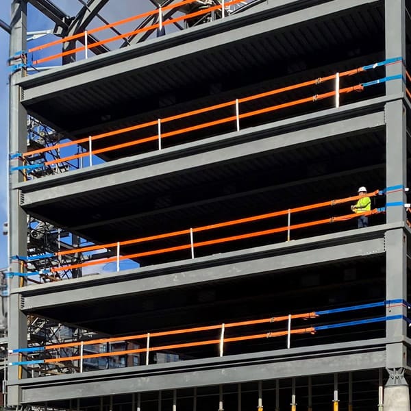 StrapRail.ca StrapRail installed on steel columns.